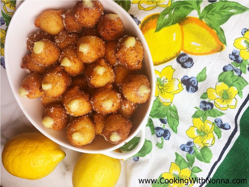 Lemon Ricotta Zeppole filled with White Chocolate Pastry Cream